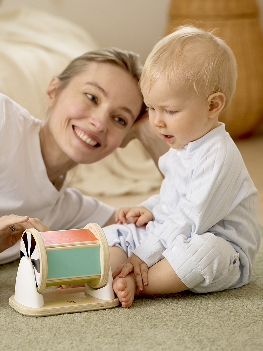 Игрушка Hape Крутящийся барабан с зеркалом - фото 3