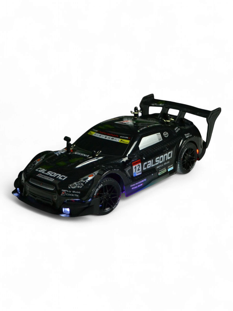 Автомобиль РУ HuangBo Toys Nissan 1:16 - фото 1