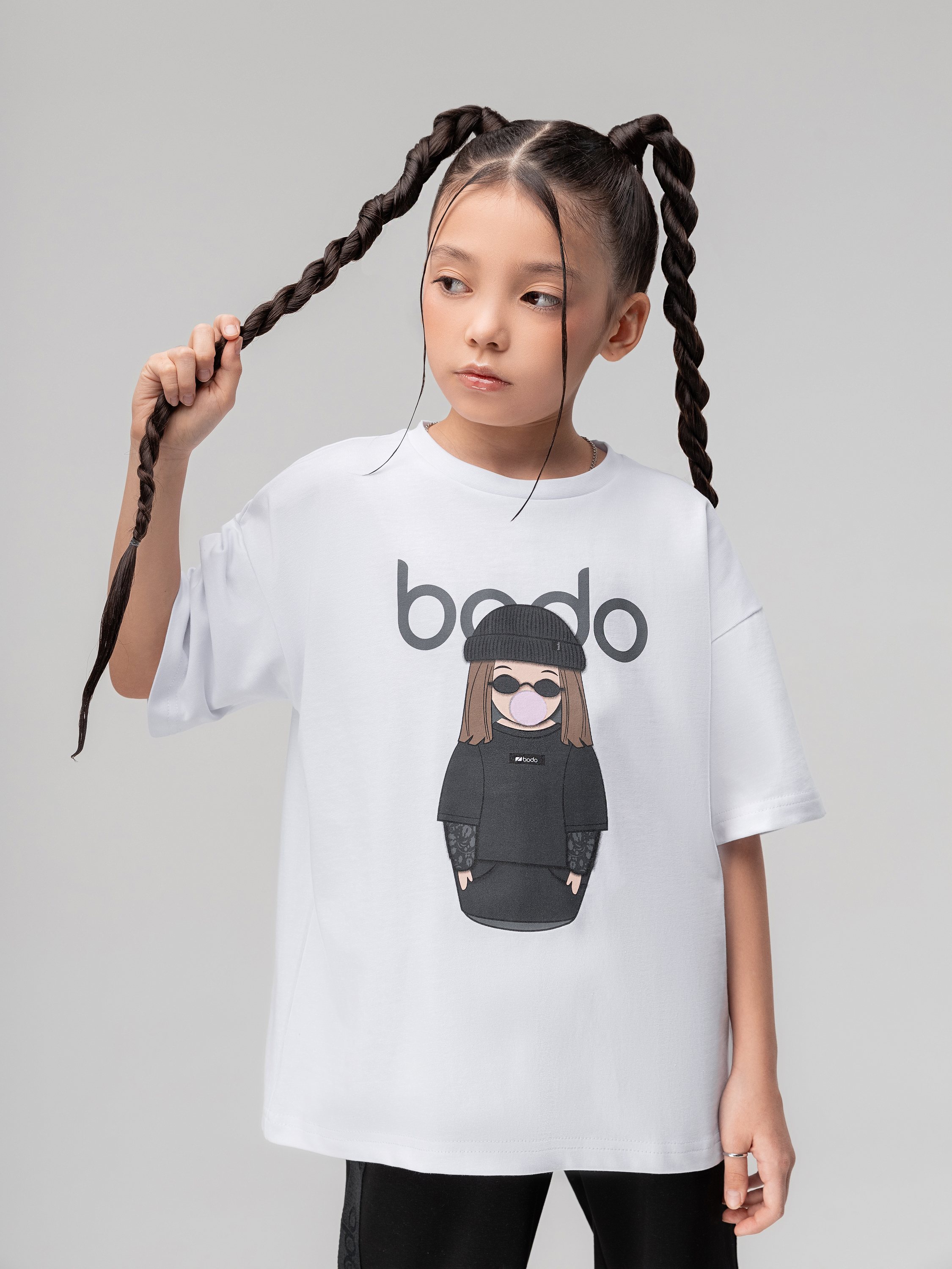 Изображение товара Детская футболка Bodo 122 с принтом Матрешка из кулирной гладкой ткани