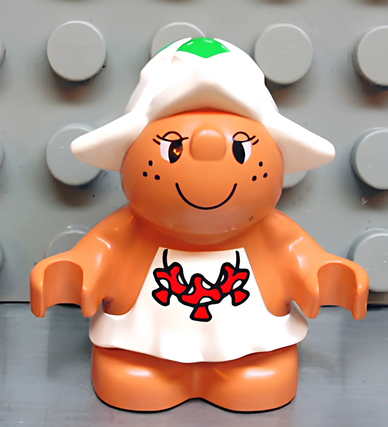 Изображение товара LEGO Duplo Минифигурка Forest Friends с красным узором, женская Изображение товара LEGO Duplo Минифигурка Forest Friends с красным узором, женская