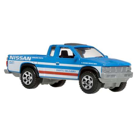 Автомобиль Matchbox Nissan 95 Nissan Hardbody 1:64 голубой