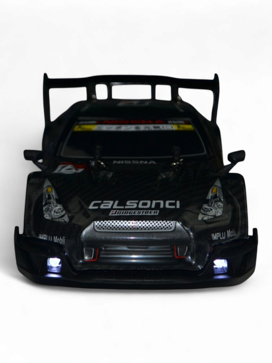 Автомобиль РУ HuangBo Toys Nissan 1:16 - фото 5