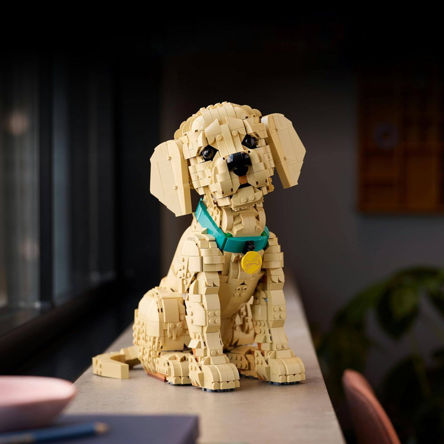 Конструктор LEGO Icons Золотистый щенок 2102 дет. - фото 9