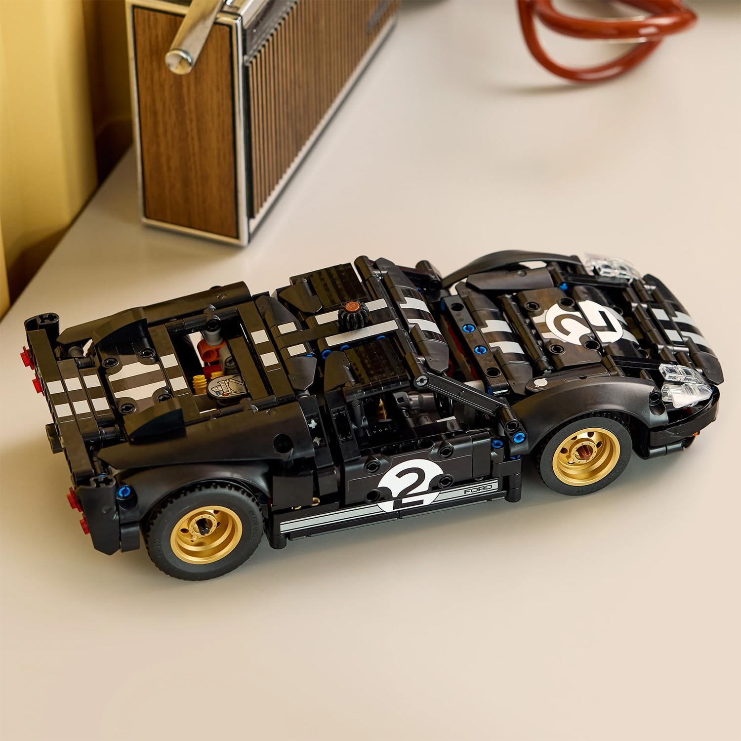 Конструктор LEGO Technic Ford GT40 MKII 1966г 793 дет. - фото 4