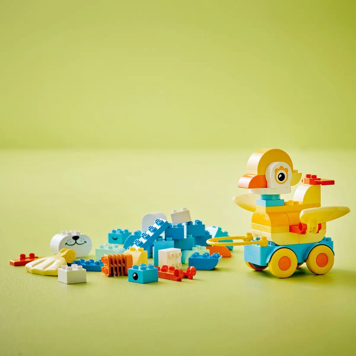 Конструктор LEGO DUPLO 3 в 1 животные на колесах 58 дет. - фото 6