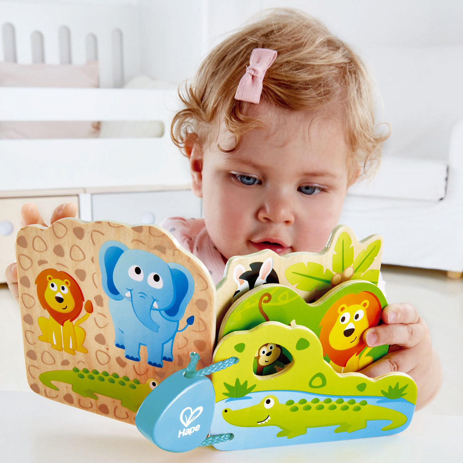 Игрушка Hape книжка Дикие животные - фото 1