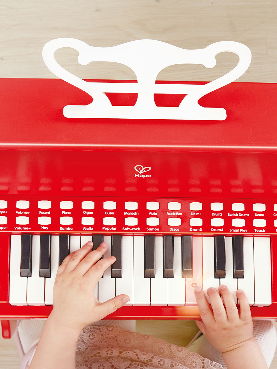 Игрушка музыкальная Hape Пианино красный с табуреткой пианино - фото 5