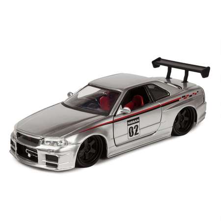 Автомобиль Jada Nissan 1:24
