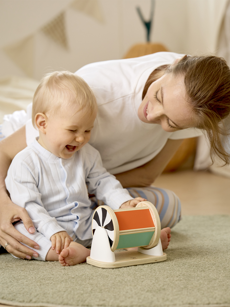 Игрушка Hape Крутящийся барабан с зеркалом - фото 5