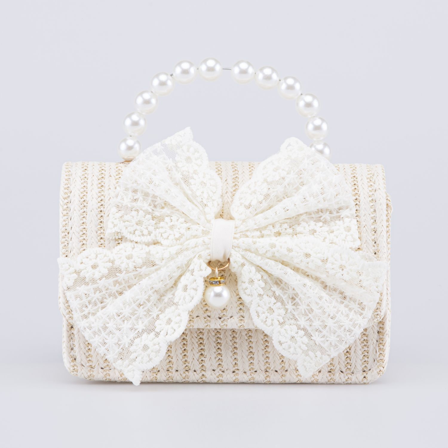 Изображение товара Котофей Сумочка детская бежевая с бантом 10x15 см