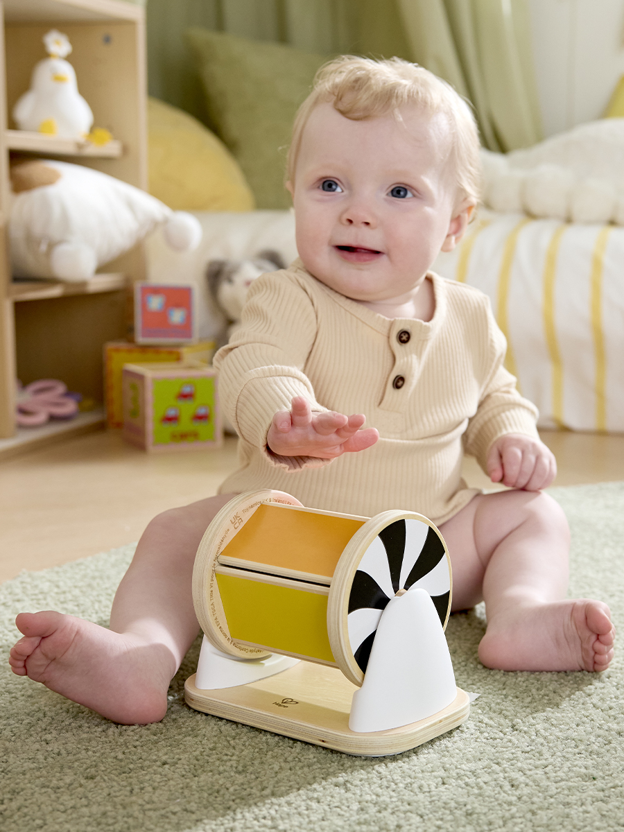 Игрушка Hape Крутящийся барабан с зеркалом - фото 1