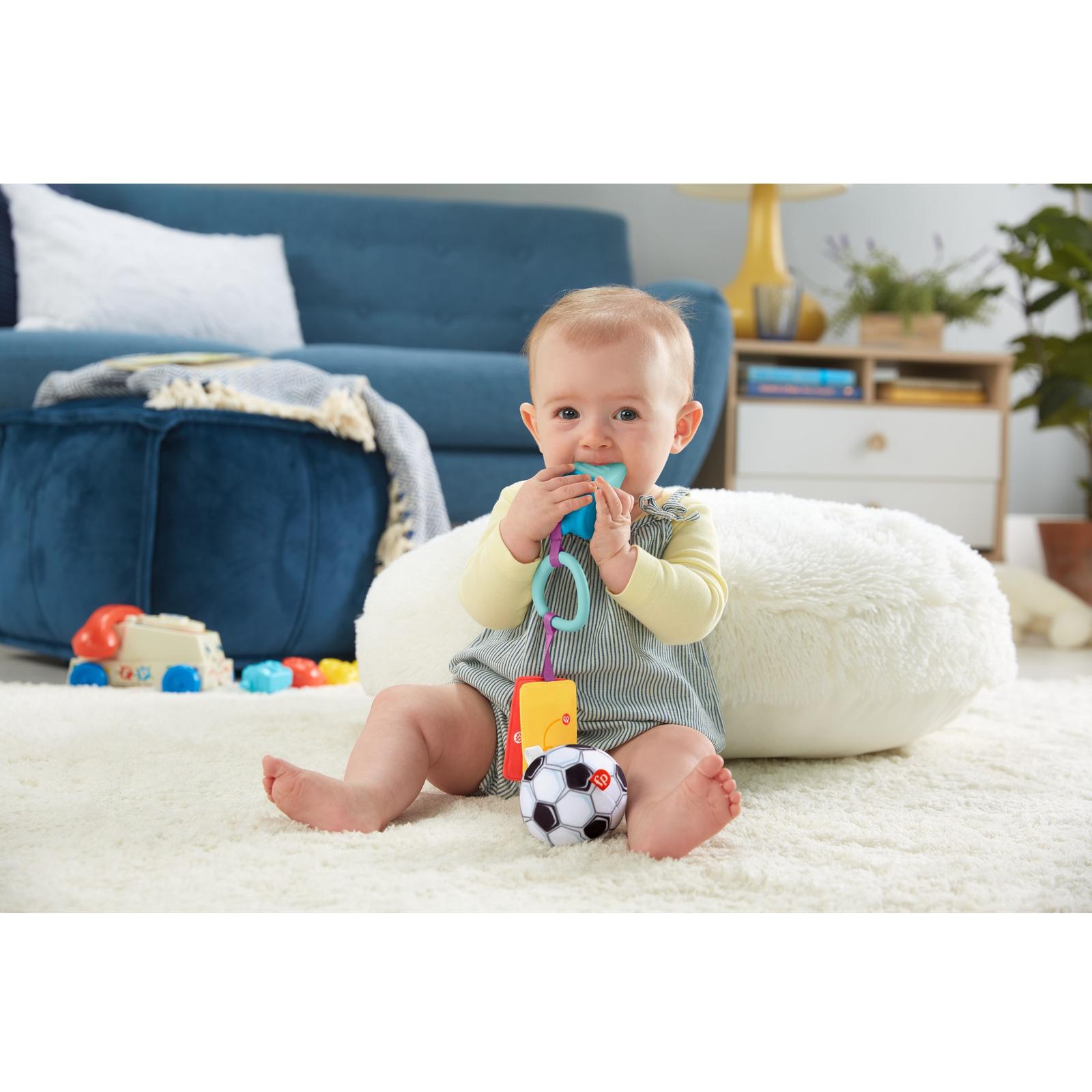 Прорезыватель Fisher Price Футболист - фото 10