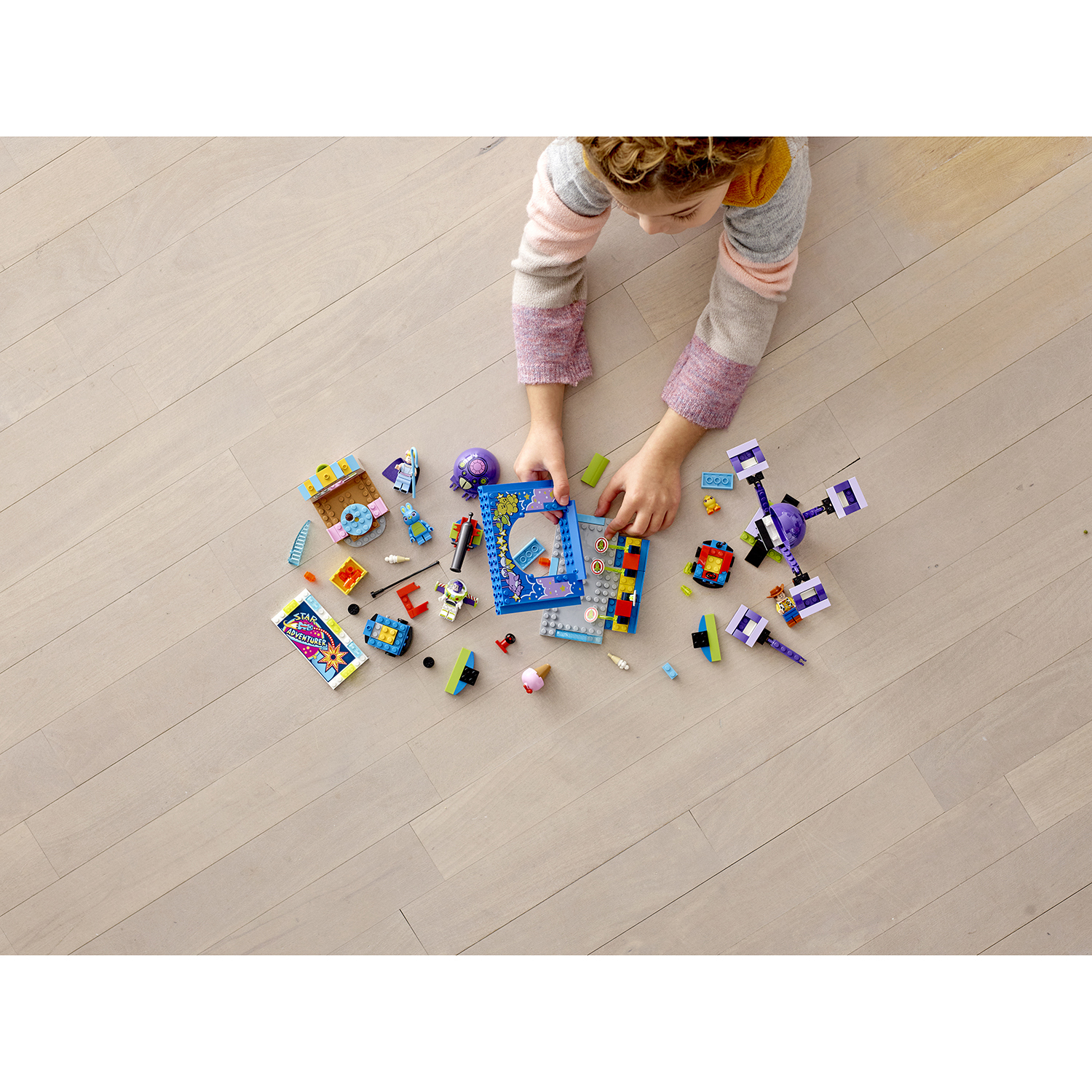 Конструктор LEGO 4+ Парк аттракционов Базза и Вуди 230 дет. - фото 4